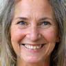 Mevrouw Willems glimlachend